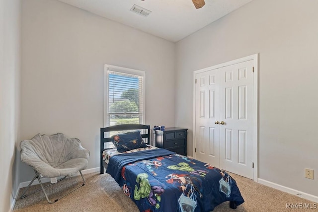 8800 Oak Meadow Ct, Montgomery, AL 36116 - carpeted bedroom with baseboards, a ceiling fan, a closet, and visible vents