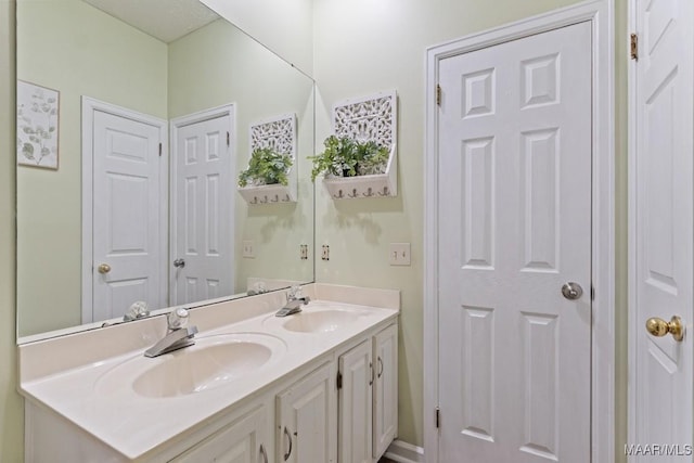 8800 Oak Meadow Ct, Montgomery, AL 36116 - bathroom featuring double vanity and a sink
