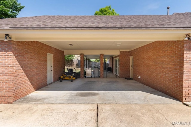 8800 Oak Meadow Ct, Montgomery, AL 36116 - view of car parking featuring fence, driveway, and a carport