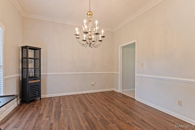 8800 Oak Meadow Ct, Montgomery, AL 36116 - spare room featuring baseboards, ornamental molding, wood finished floors, and a chandelier