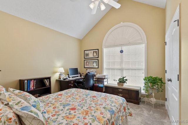 carpeted bedroom with a ceiling fan, baseboards, and high vaulted ceiling