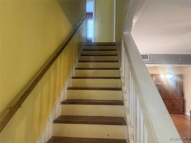 3037 Willow Lane Dr, Montgomery, AL 36109 - stairway with wood finished floors and visible vents