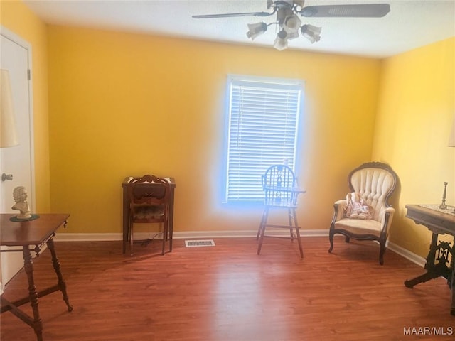 3037 Willow Lane Dr, Montgomery, AL 36109 - living area featuring a ceiling fan, baseboards, visible vents, and wood finished floors