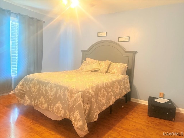 3037 Willow Lane Dr, Montgomery, AL 36109 - bedroom with baseboards and wood finished floors