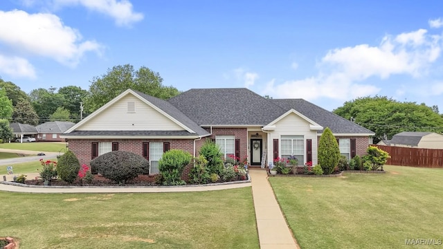 177 Old Orchard Loop, Deatsville, AL 36022 - view of front of home featuring brick siding and a shingled roof