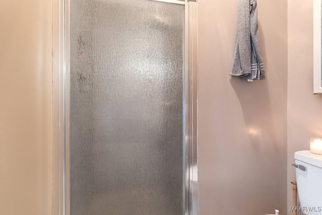 177 Old Orchard Loop, Deatsville, AL 36022 - bathroom with a stall shower and toilet