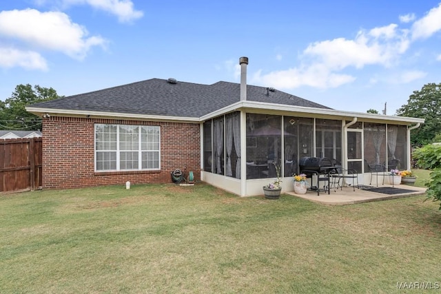 177 Old Orchard Loop, Deatsville, AL 36022 - rear view of house featuring a sunroom, a patio area, brick siding, and roof with shingles