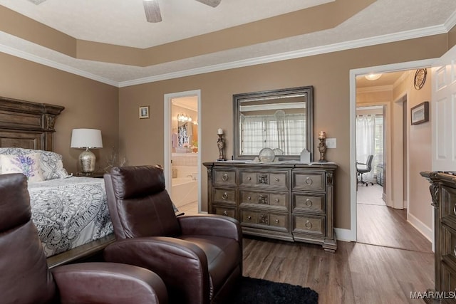 177 Old Orchard Loop, Deatsville, AL 36022 - bedroom featuring wood finished floors, ensuite bath, crown molding, baseboards, and a raised ceiling