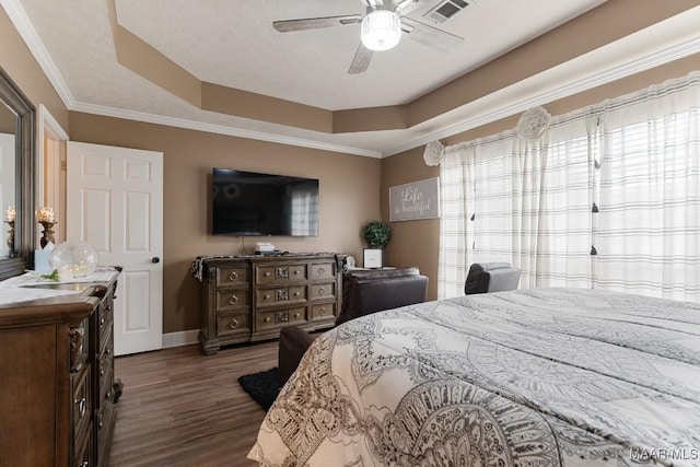 177 Old Orchard Loop, Deatsville, AL 36022 - bedroom featuring a raised ceiling, dark wood-type flooring, baseboards, a ceiling fan, and ornamental molding