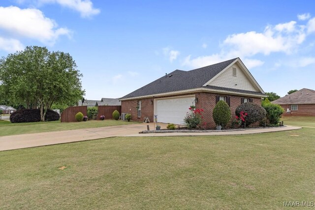 177 Old Orchard Loop, Deatsville, AL 36022 - view of property exterior featuring driveway, an attached garage, brick siding, and roof with shingles