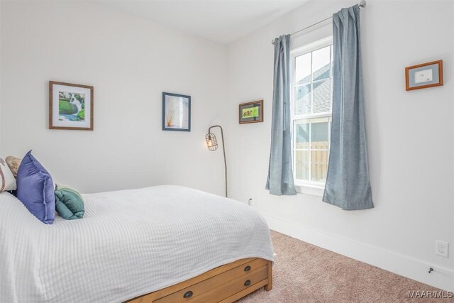 8307 Young Xing, Montgomery, AL 36116 - carpeted bedroom featuring baseboards