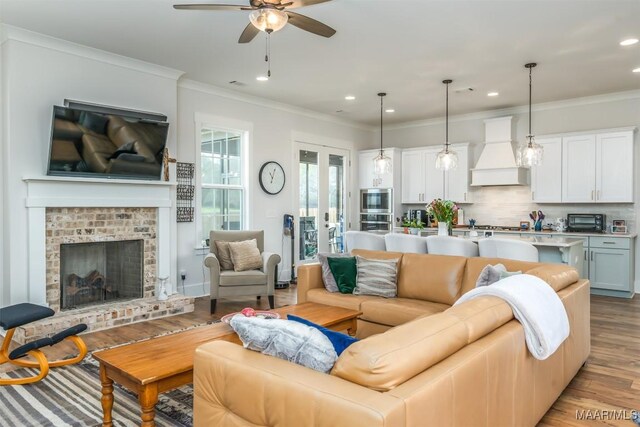 8307 Young Xing, Montgomery, AL 36116 - living area with ceiling fan, light wood-style flooring, recessed lighting, a toaster, and ornamental molding
