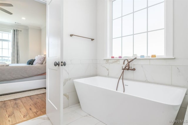 8307 Young Xing, Montgomery, AL 36116 - full bath with crown molding, connected bathroom, ceiling fan, and a freestanding bath