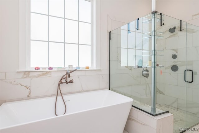 8307 Young Xing, Montgomery, AL 36116 - full bath with a stall shower and a freestanding bath