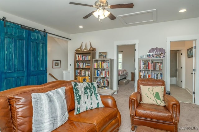 8307 Young Xing, Montgomery, AL 36116 - sitting room featuring a ceiling fan, attic access, a barn door, carpet, and recessed lighting