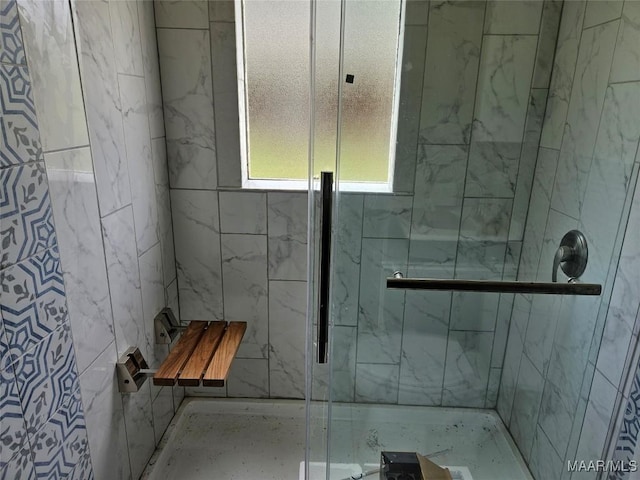 full bathroom featuring a stall shower