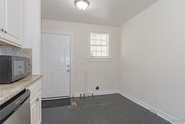 1943 Gorgas St, Montgomery, AL 36106 - interior space featuring baseboards, ornamental molding, dishwasher, and white cabinets