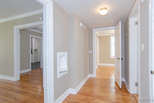 1943 Gorgas St, Montgomery, AL 36106 - hall with crown molding, baseboards, and light wood finished floors