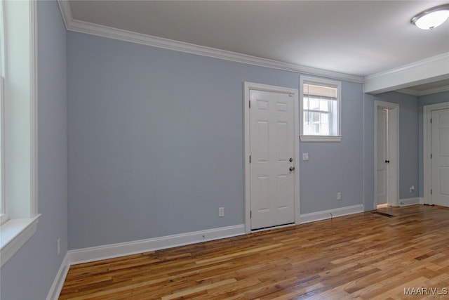 1943 Gorgas St, Montgomery, AL 36106 - spare room featuring baseboards, ornamental molding, and wood finished floors