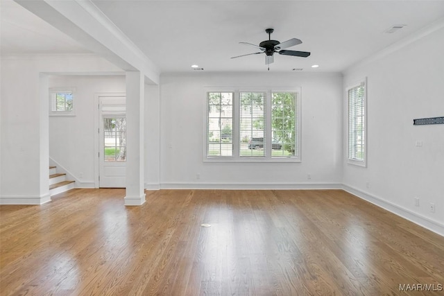 4831 Clerkenwell St, Montgomery, AL 36116 - unfurnished living room with stairway, baseboards, a ceiling fan, and light wood finished floors
