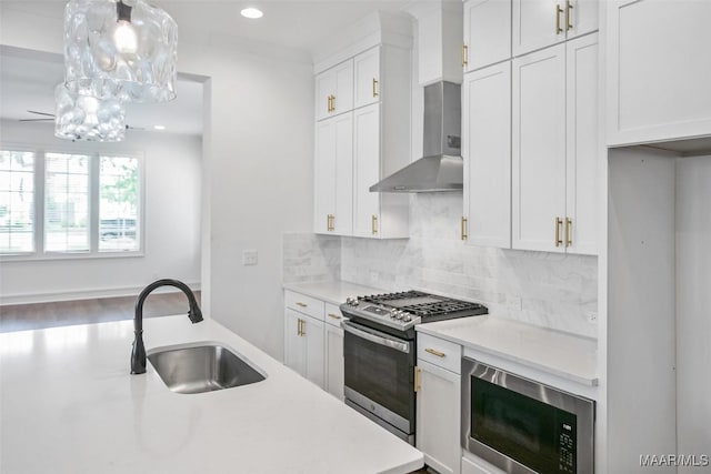 4831 Clerkenwell St, Montgomery, AL 36116 - kitchen with tasteful backsplash, built in microwave, stainless steel gas stove, a sink, and light countertops