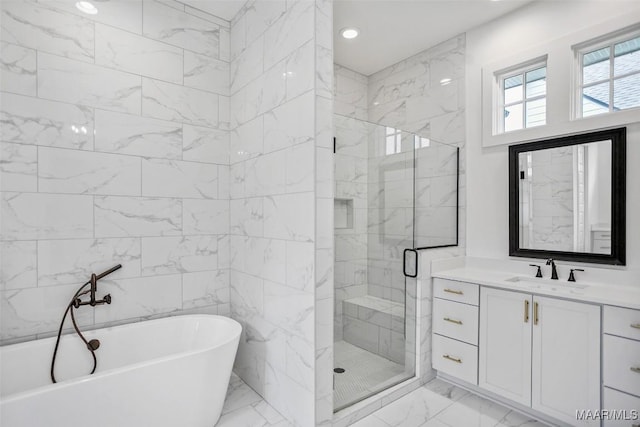 4831 Clerkenwell St, Montgomery, AL 36116 - bathroom with a freestanding bath, vanity, marble finish floor, recessed lighting, and a stall shower