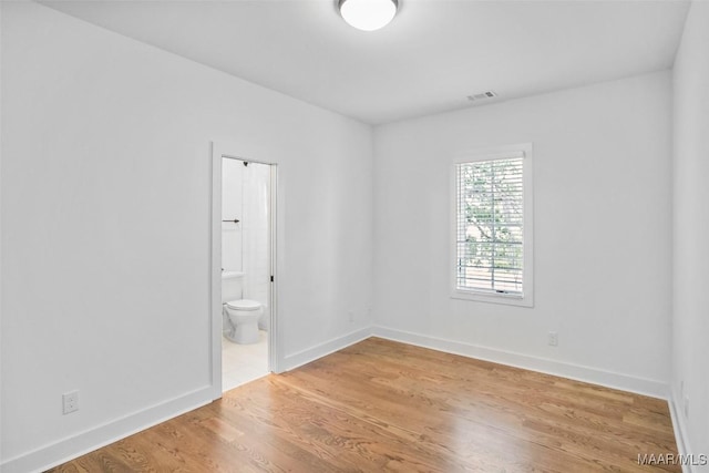 4831 Clerkenwell St, Montgomery, AL 36116 - unfurnished room with baseboards, visible vents, and light wood-type flooring