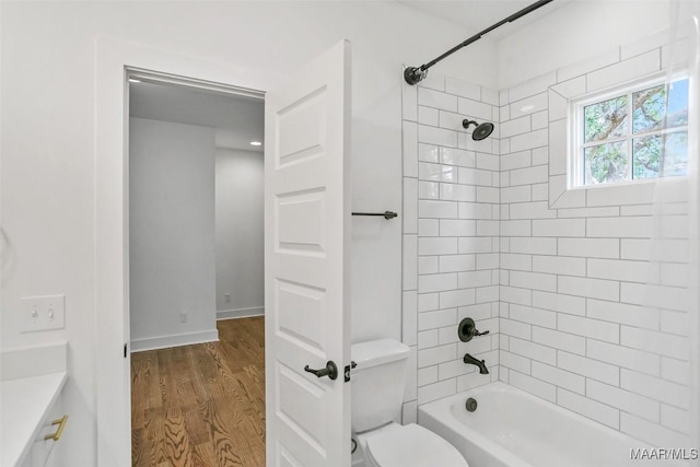 4831 Clerkenwell St, Montgomery, AL 36116 - bathroom with bathing tub / shower combination, toilet, and wood finished floors