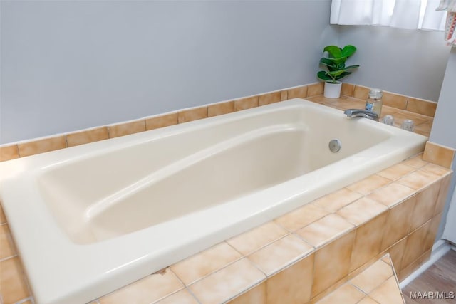 full bathroom featuring a bath
