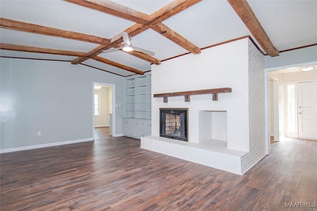 unfurnished living room featuring a fireplace, a ceiling fan, baseboards, vaulted ceiling with beams, and wood finished floors