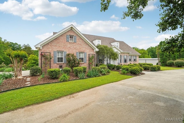 1750 County Road 461, Clanton, AL 35046 - view of front of home featuring brick siding and a front yard