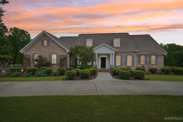 1750 County Road 461, Clanton, AL 35046 - view of front of property with brick siding and a yard
