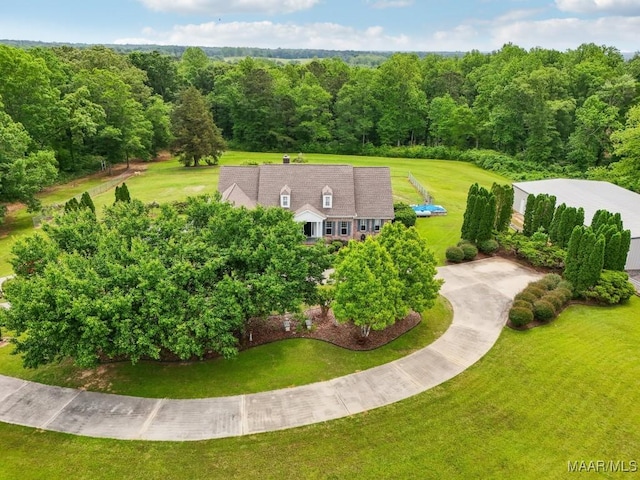 1750 County Road 461, Clanton, AL 35046 - aerial view of property and surrounding area with a forest