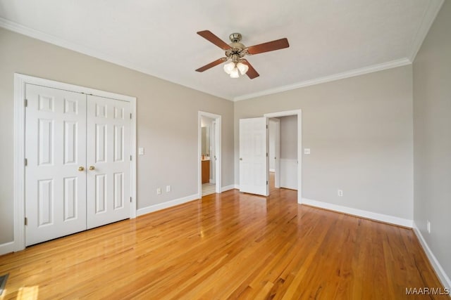 1750 County Road 461, Clanton, AL 35046 - unfurnished bedroom with crown molding, light wood-style flooring, ensuite bathroom, a ceiling fan, and a closet