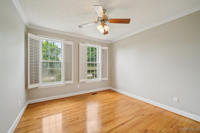 1750 County Road 461, Clanton, AL 35046 - empty room featuring ornamental molding, wood finished floors, and ceiling fan