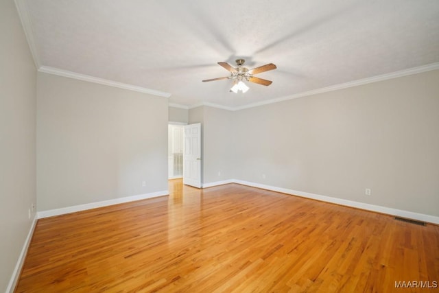 1750 County Road 461, Clanton, AL 35046 - empty room featuring a ceiling fan, light wood-style flooring, and ornamental molding