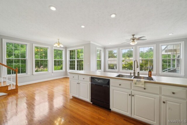 1750 County Road 461, Clanton, AL 35046 - kitchen with dishwasher, a chandelier, crown molding, white cabinets, and recessed lighting