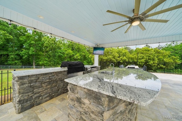 1750 County Road 461, Clanton, AL 35046 - view of patio with exterior kitchen and a ceiling fan