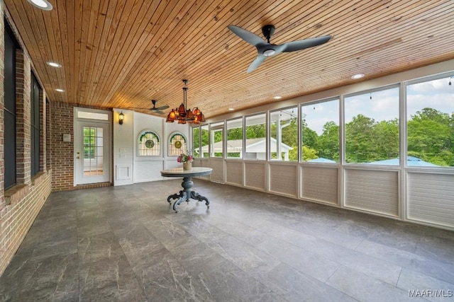 1750 County Road 461, Clanton, AL 35046 - unfurnished sunroom with ceiling fan and a chandelier