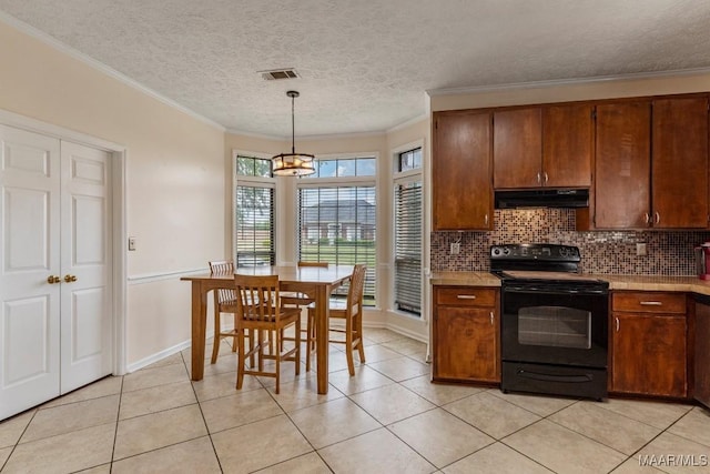 kitchen with light countertops, backsplash, under cabinet range hood, and black electric range