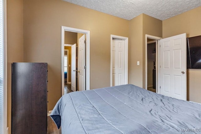 bedroom featuring a textured ceiling