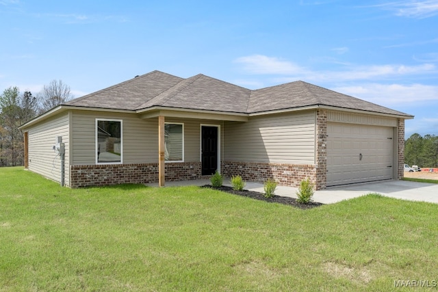 202 Canal Xing, Wetumpka, AL 36092 - view of front facade with a front lawn, roof with shingles, brick siding, concrete driveway, and an attached garage