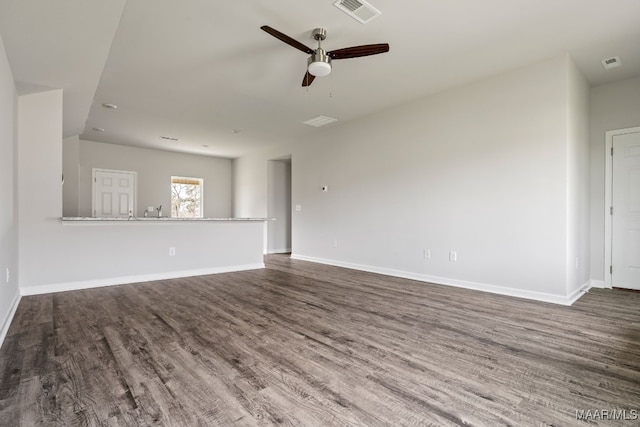 202 Canal Xing, Wetumpka, AL 36092 - unfurnished living room featuring a ceiling fan, baseboards, visible vents, and wood finished floors