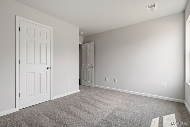 202 Canal Xing, Wetumpka, AL 36092 - unfurnished bedroom featuring baseboards, carpet, and visible vents