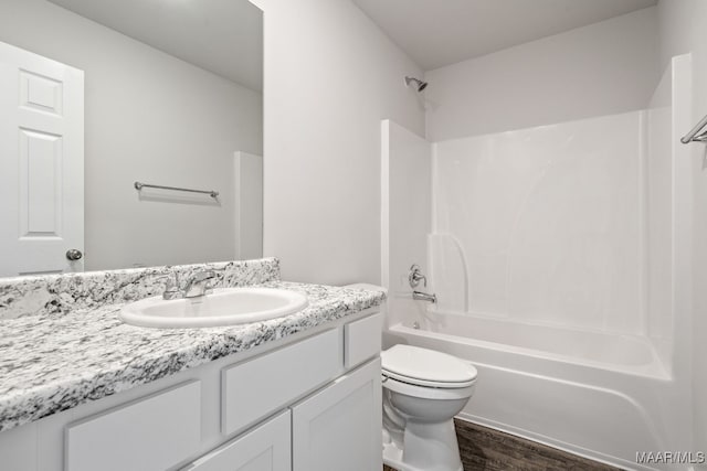202 Canal Xing, Wetumpka, AL 36092 - bathroom with toilet, bathing tub / shower combination, wood finished floors, and vanity