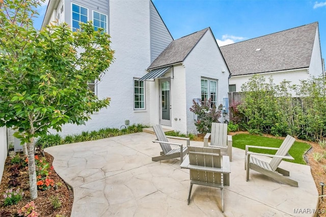 view of patio / terrace featuring fence