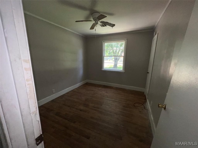 223 Mcdonald Ave, Selma, AL 36701 - spare room featuring wood finished floors, crown molding, a ceiling fan, and baseboards