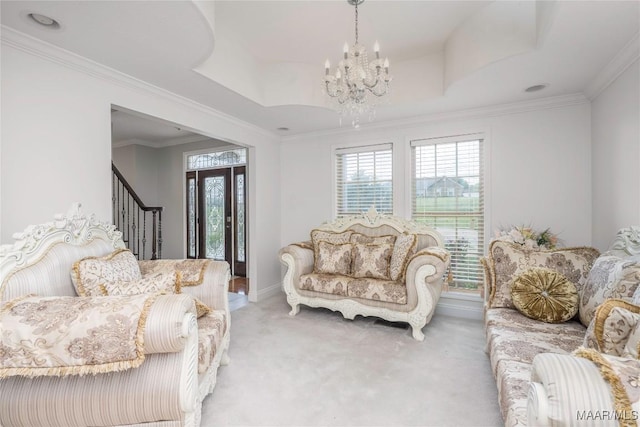 211 Carter Ln, Valley Grande, AL 36703 - living room featuring stairs, a chandelier, healthy amount of natural light, light carpet, and crown molding