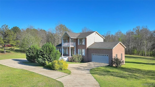 traditional-style house with an attached garage, a front lawn, brick siding, a balcony, and driveway