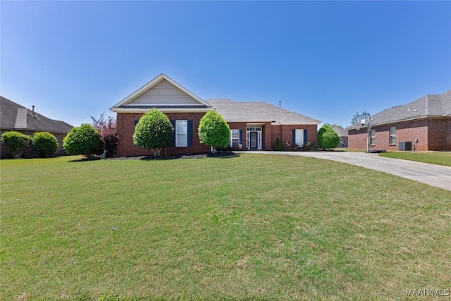 603 Coleman Way, Prattville, AL 36067 - single story home with central AC unit, a front lawn, brick siding, and driveway